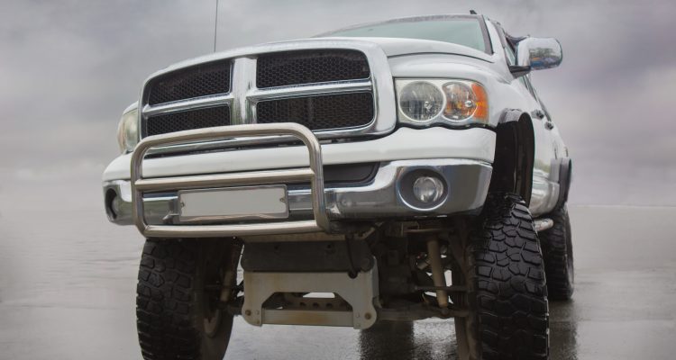 lifted truck in the rain