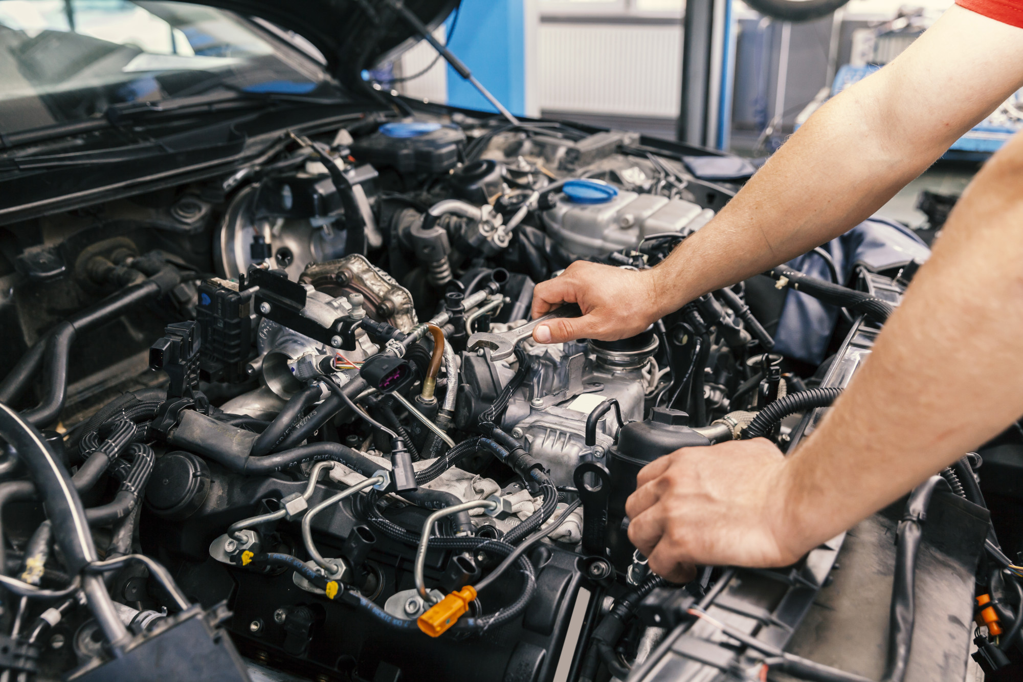 man working on engine