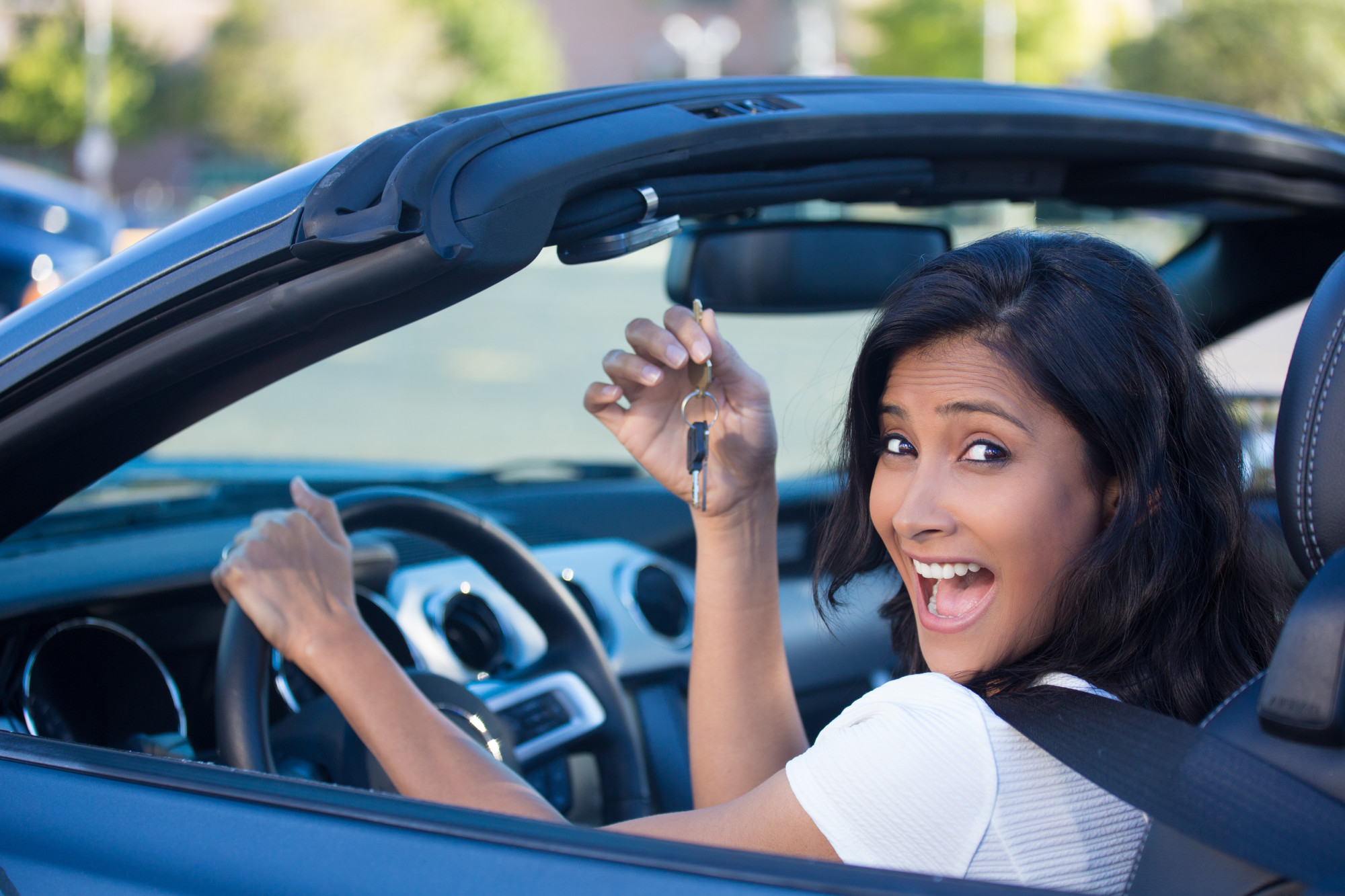 woman buying new car