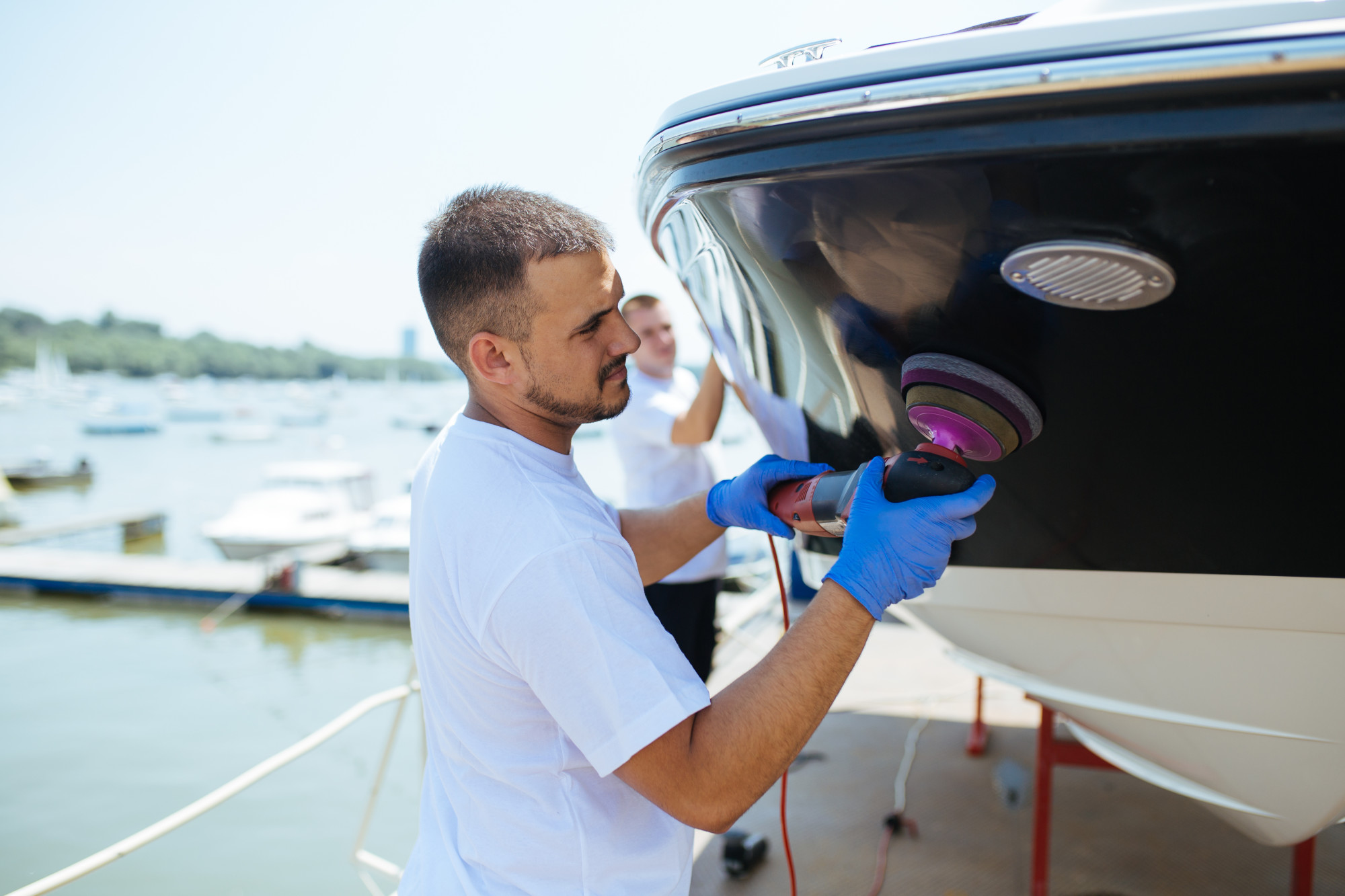 People Cleaning a Boat