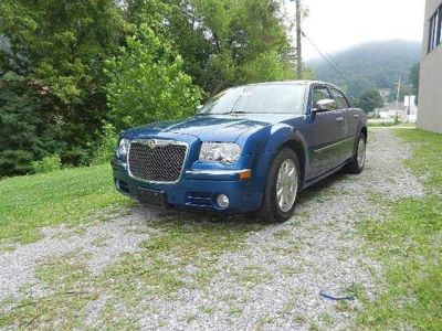 2010 Chrysler 300C -
   Cars.com </title>
   <meta name="title" content="2010 Chrysler 300C - Cars.com"/>
   <meta name="description" content="Listed on Cars.com