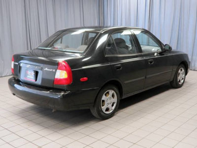 2002 Hyundai Accent  GL -
   Cars.com </title>
   <meta name="title" content="2002 Hyundai Accent  GL - Cars.com"/>
   <meta name="description" content="Listed on Cars.com
