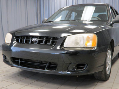 2002 Hyundai Accent  GL -
   Cars.com </title>
   <meta name="title" content="2002 Hyundai Accent  GL - Cars.com"/>
   <meta name="description" content="Listed on Cars.com