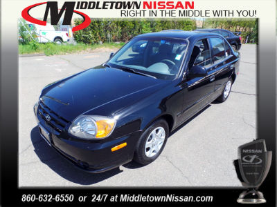 2003 Hyundai Accent  GL -
   Cars.com </title>
   <meta name="title" content="2003 Hyundai Accent  GL - Cars.com"/>
   <meta name="description" content="Listed on Cars.com