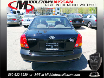 2003 Hyundai Accent  GL -
   Cars.com </title>
   <meta name="title" content="2003 Hyundai Accent  GL - Cars.com"/>
   <meta name="description" content="Listed on Cars.com