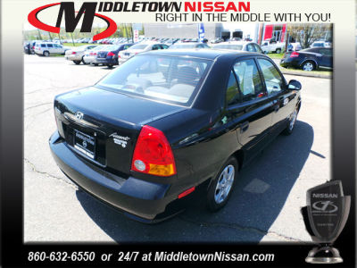 2003 Hyundai Accent  GL -
   Cars.com </title>
   <meta name="title" content="2003 Hyundai Accent  GL - Cars.com"/>
   <meta name="description" content="Listed on Cars.com