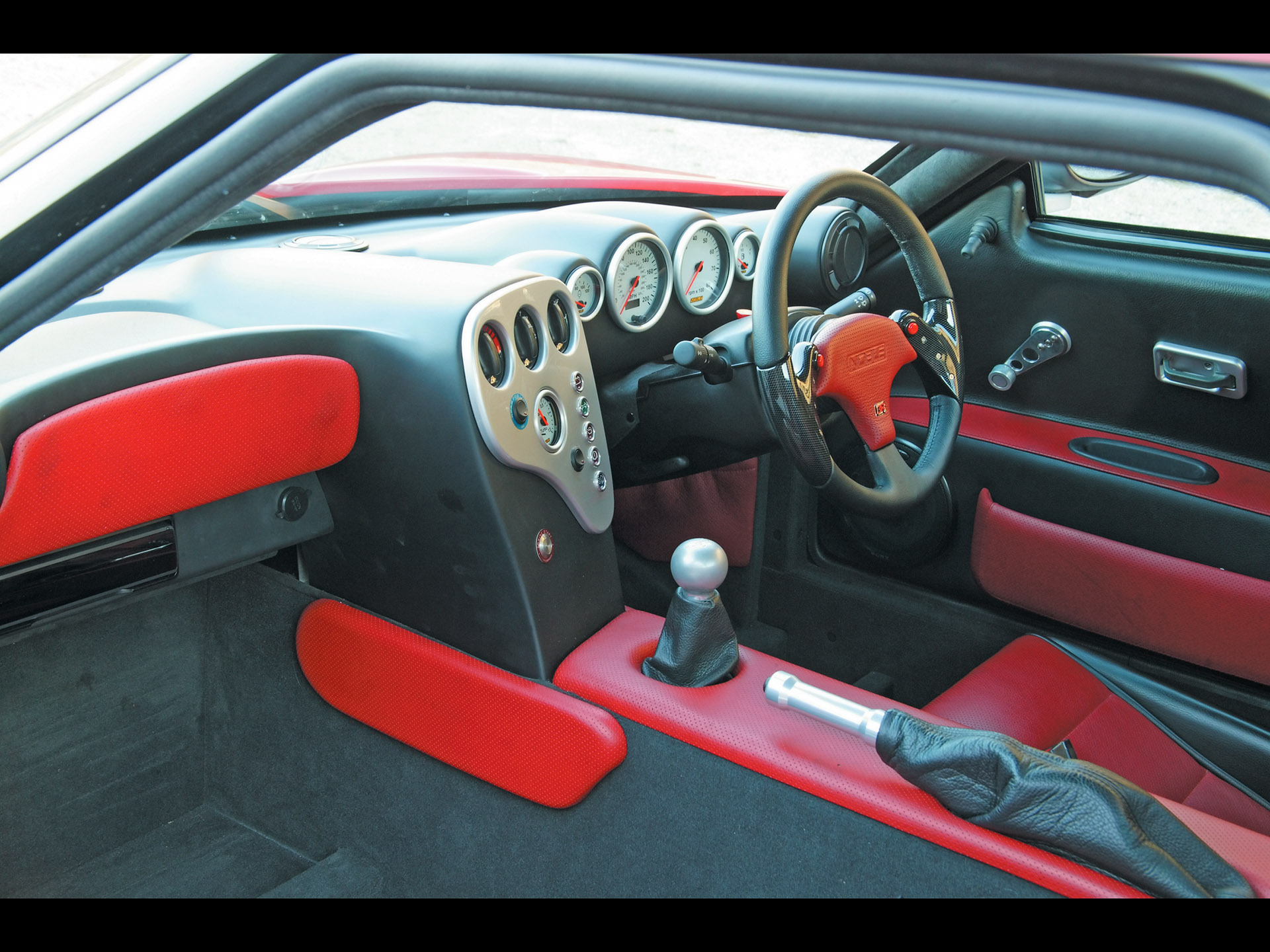 М12 автомобиль. Noble m12 GTO-3r. Noble m12 салон. Noble m400 салон. Noble m12 GTO Interior.