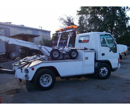 Isuzu NPR rollback wrecker