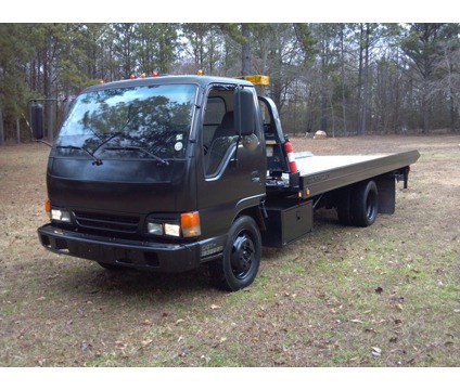 Isuzu NPR rollback wrecker