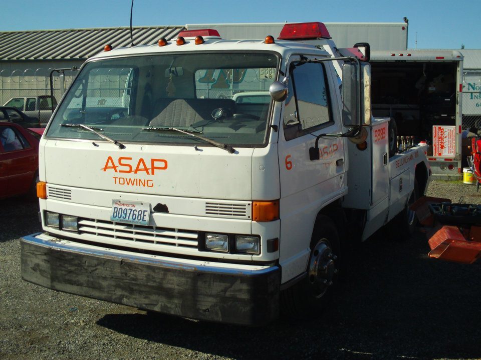 Isuzu NPR rollback wrecker